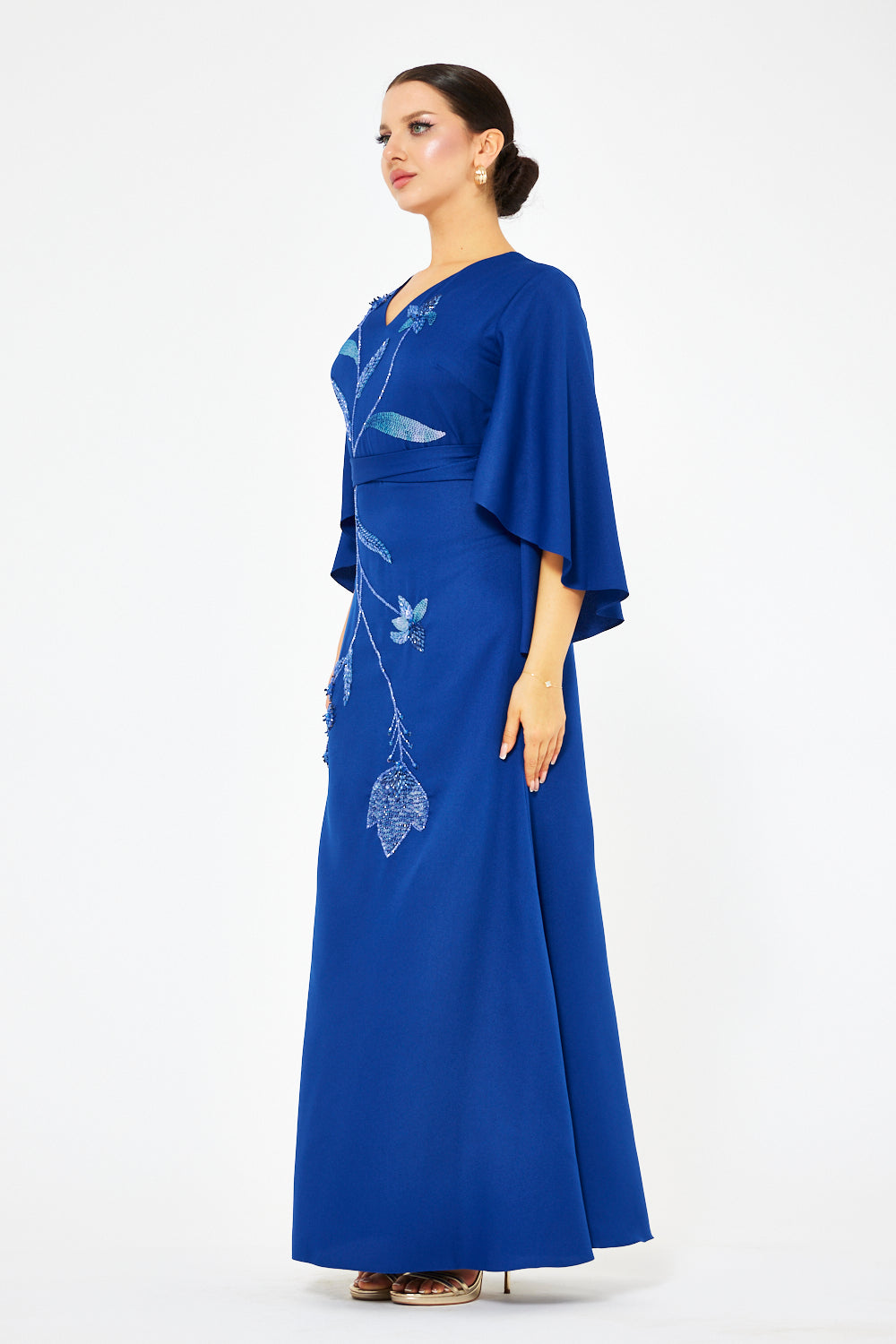 Floral Cascade Cape Sleeve Gown